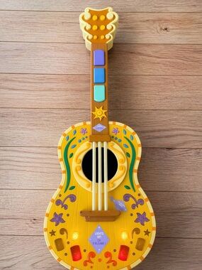 Disney Yellow Floral Toy Guitar with Purple and Blue Buttons